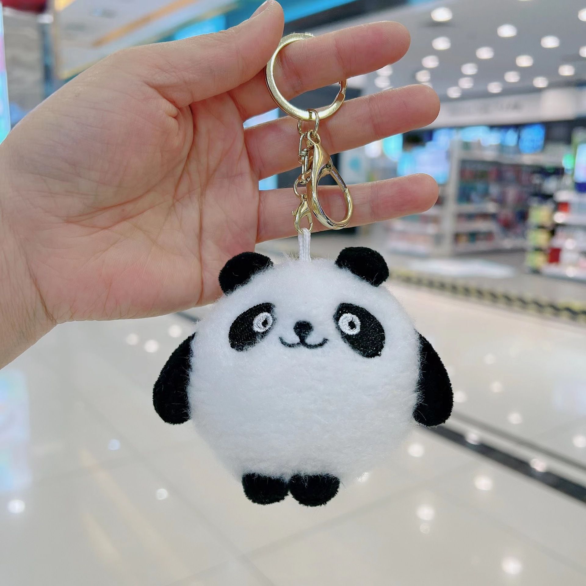 Modedesign tecknad panda plysch leksak nyckelringar liten mini docka pendellock nyckelkedja prydnad