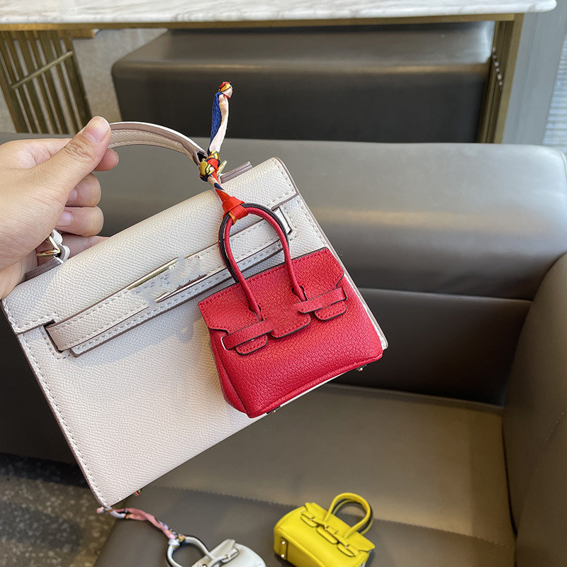 Designer Keychains Mode Ladies Birkin Bag Anhänger Luxus Lippenstifttaschen Herren Auto Schlüsselanhänger Keyrings 10 Stile