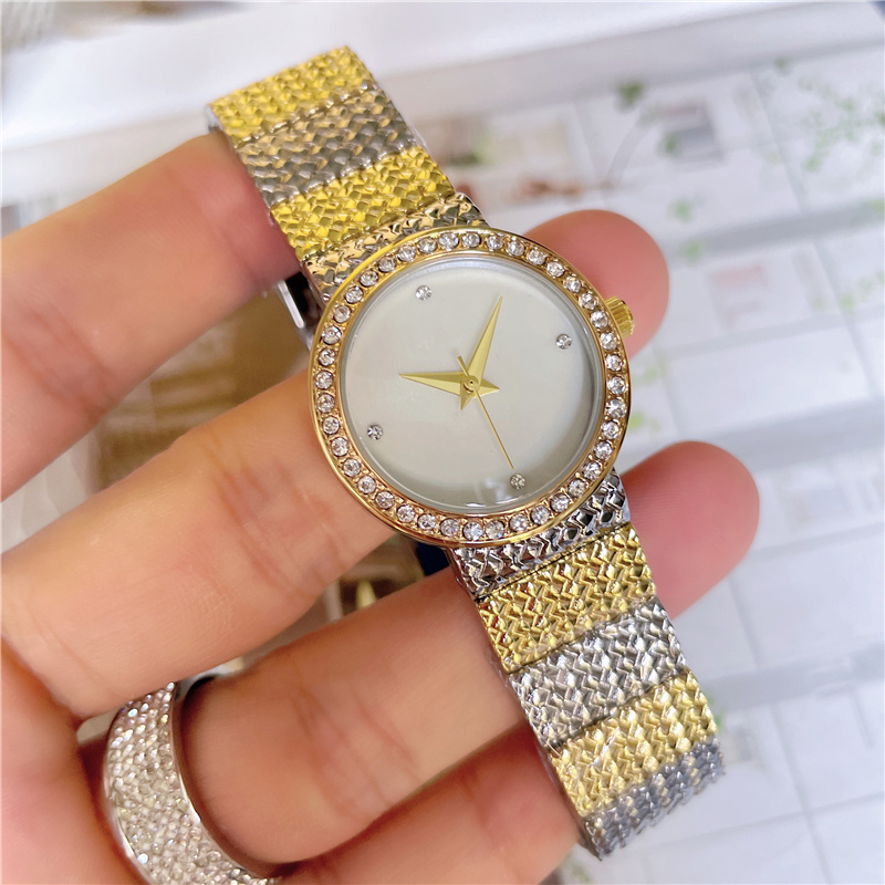 Marque de mode montres-bracelets femmes dames fille cristal Style luxe métal acier bande Quartz horloge Di 44