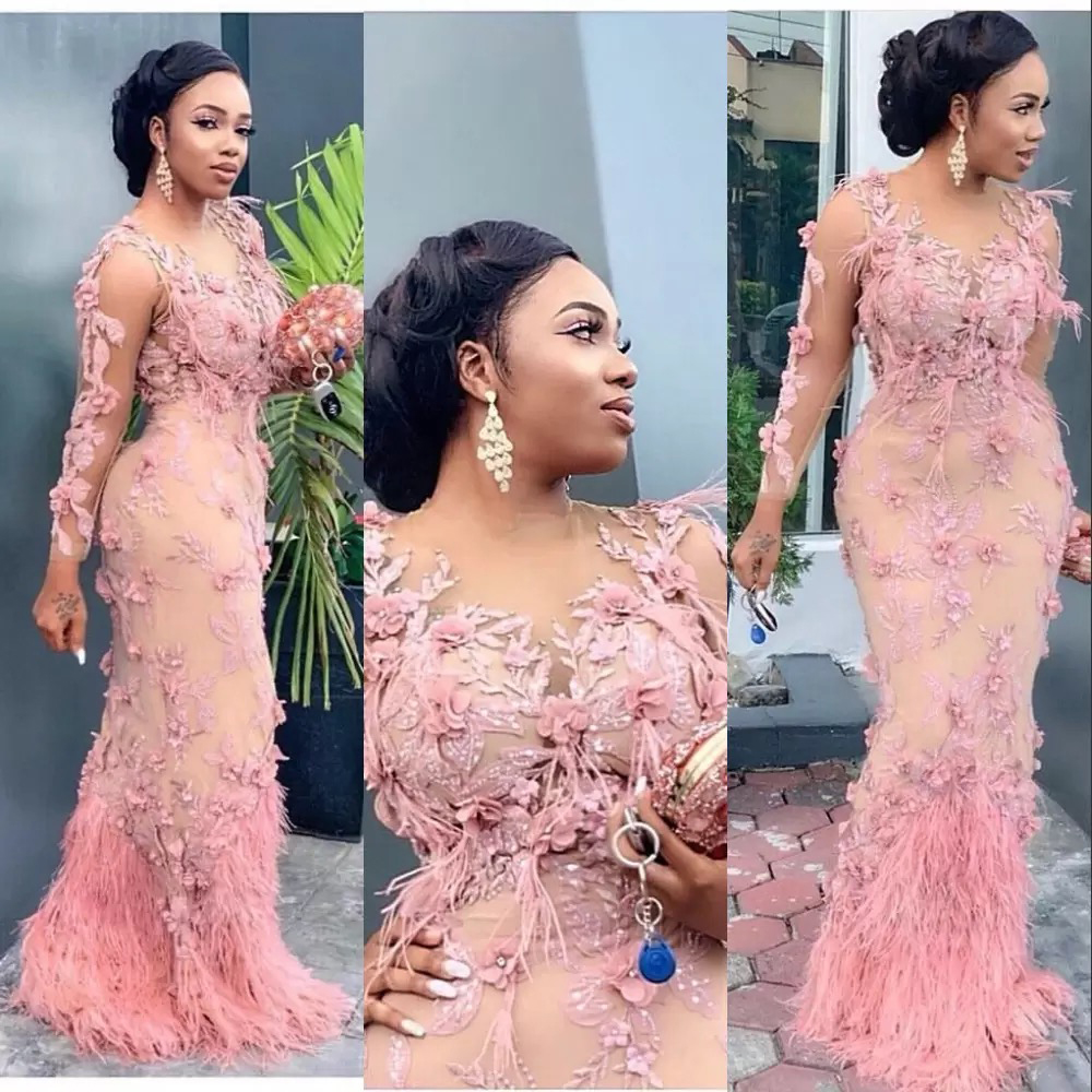 Pink Aso Ebi Arabisch luxuriöser Spitze Perlen Abendkleider Feather Meerjungfrau Langarm Kleid Kristallperlen formelle Party zweite Empfangskleider