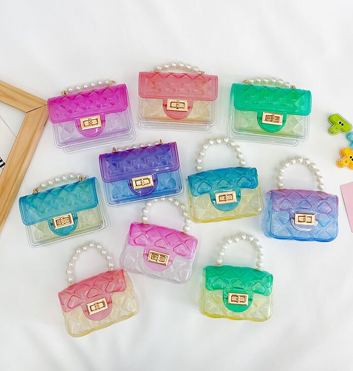 Mini flickor transparent handväska mode barn korsbodi axelväskor små myntväska fabriksförsörjning