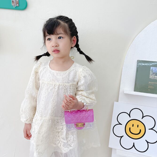 Mini flickor transparent handväska mode barn korsbodi axelväskor små myntväska fabriksförsörjning
