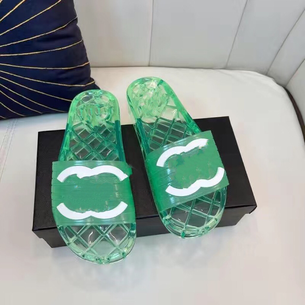 Tofflor transparent söt sandaler designer 2022 godisfärgade lägenheter gummistellskor flip-flops utomhus strandskor stövlar