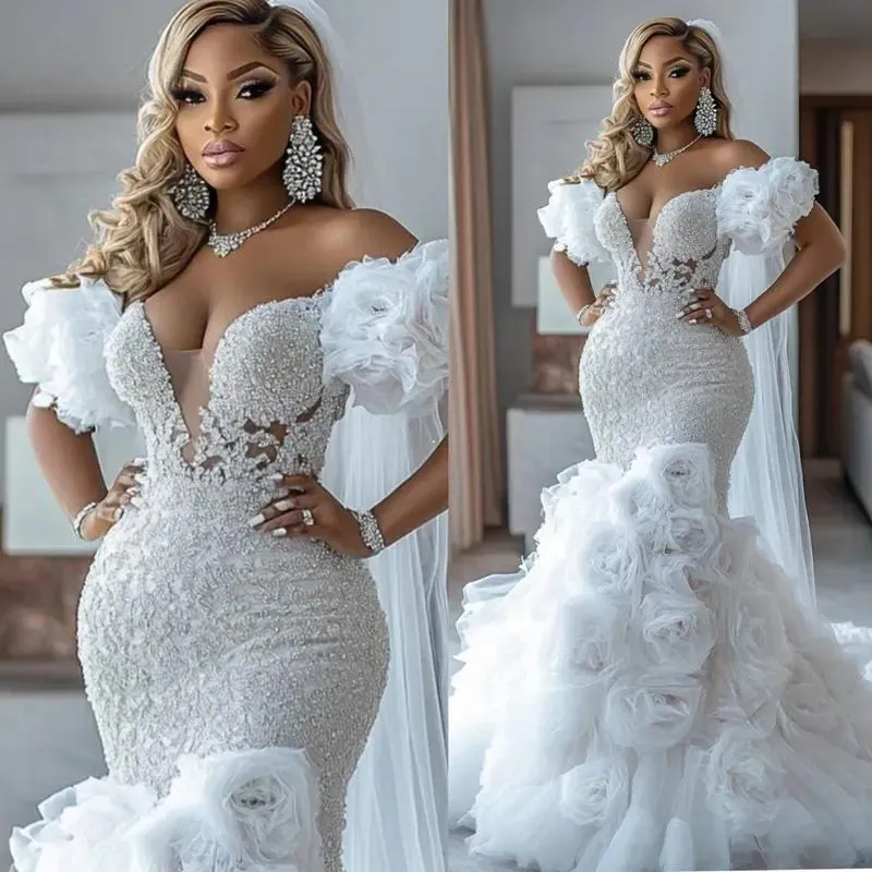 Buyers' PicksArabic Aso Ebi Ivory Wedding Dress 2026 Mermaid Bridal Gowns For Bride Off Shoulder V Neck Sexy Flora Tiered Tulle Charming Wedding Gowns gb23