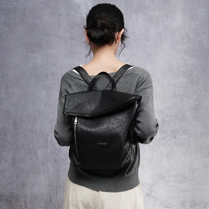 black leather fold backpack Thursday Boot Company Men's Rugged Boot OS The Fold backpack has a convenient trolley strap on the back panel. ALEXANDER WANG Black Fold Over