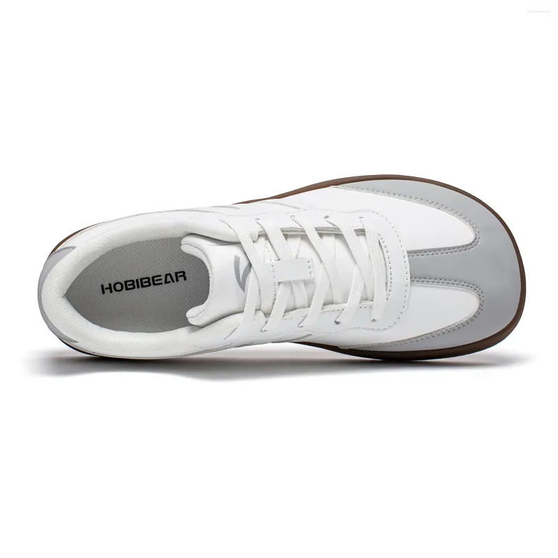 Fitness-sneakers retro med bred tåbox och snörning unisex_voghion.com