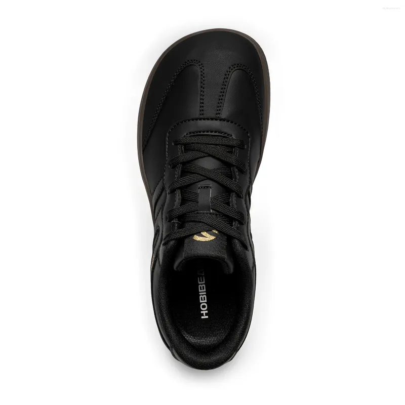 Fitness-sneakers retro med bred tåbox och snörning unisex_voghion.com