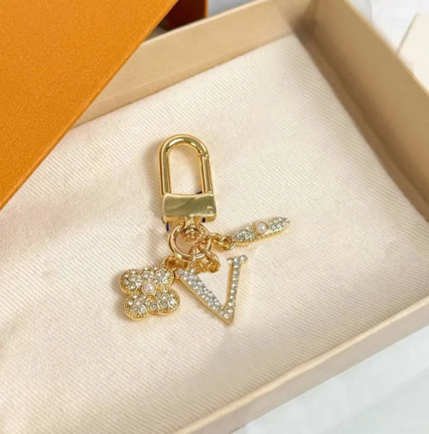 Gold Tone Keychain With Crystal Clover And Arrow Charms, 14K Gold ...