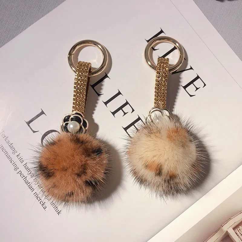 Rhinestone Camellia Keychain With Fluffy Mink Ball Bag Charm_voghion.com