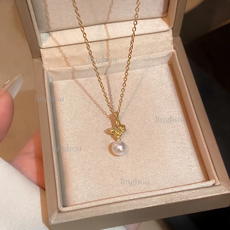 Collana di design 2026, marchio di lusso, gioielli da donna, nicchia, acciaio al titanio, texture di alta gamma, elegante pendente con zirconi e perle_voghion.com