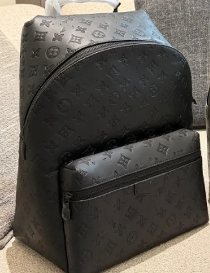louis vuitton backpack wholesale Duffle Bag Adjustable textile straps and a top handle give carry options. Wholesale Cheap Vuitton Backpack -