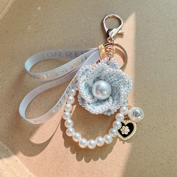 Free Shipping 2026 Korean Style Pearl Camellia Flower Keychain Creative Design Bag Charm Pendant Elegant Car Key Ring_voghion.com