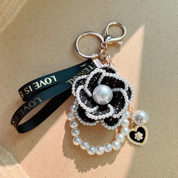 Free Shipping 2026 Korean Style Pearl Camellia Flower Keychain Creative Design Bag Charm Pendant Elegant Car Key Ring_voghion.com