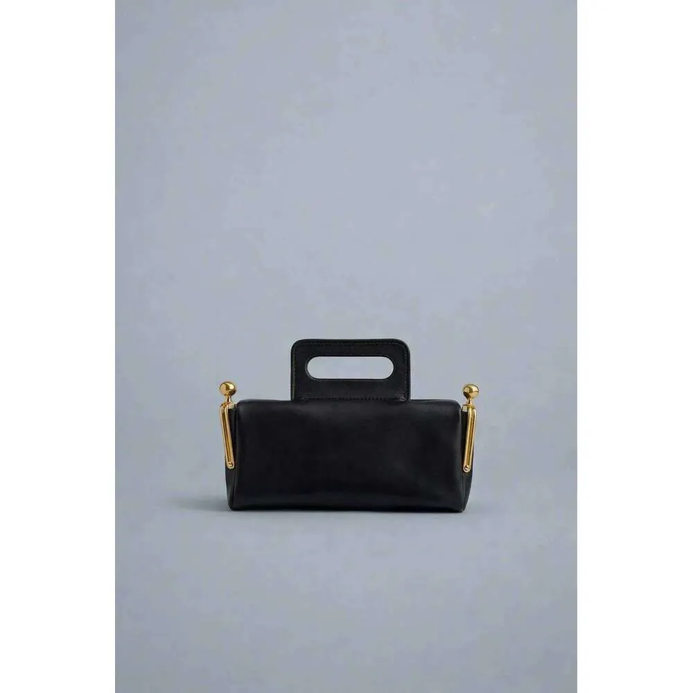 Luxe designer handtas met klemgesp van kunstleer voor dames_voghion.com