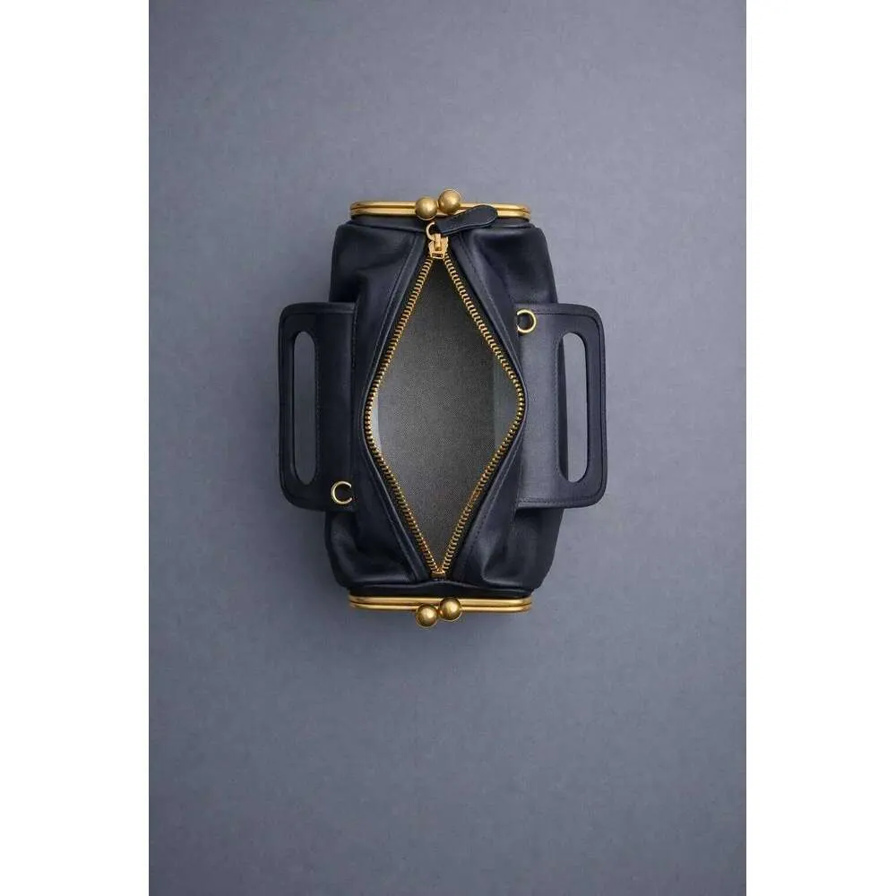 Luxe designer handtas met klemgesp van kunstleer voor dames_voghion.com