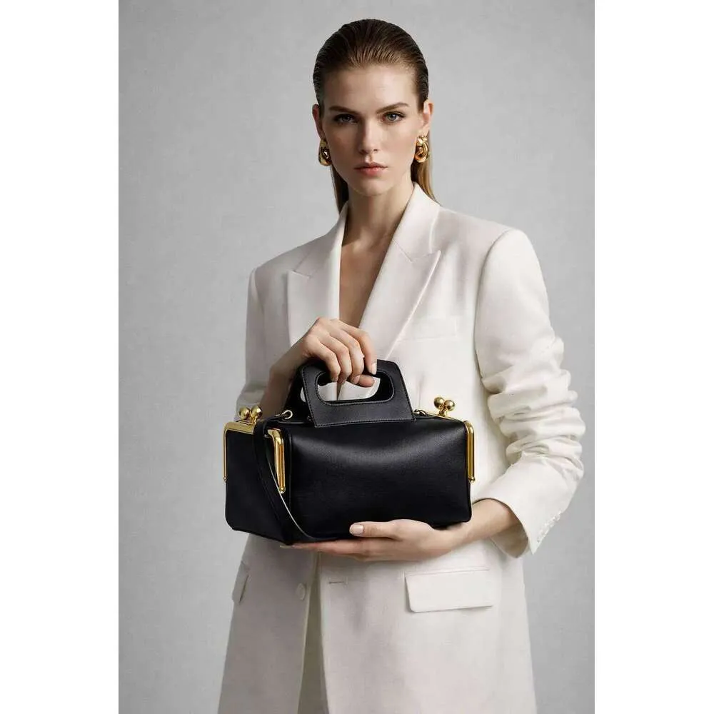 Luxe designer handtas met klemgesp van kunstleer voor dames_voghion.com