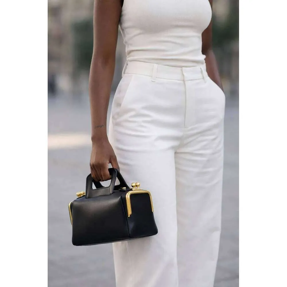 Luxe designer handtas met klemgesp van kunstleer voor dames_voghion.com