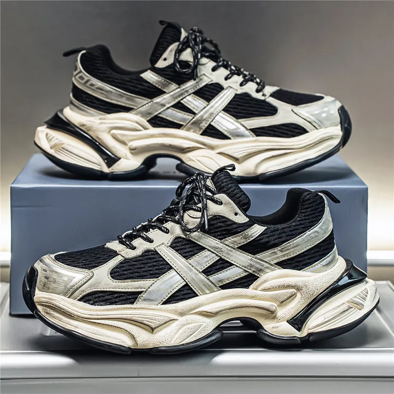 Sneakers da uomo nere e argento, robuste e massicce, modello "dad sneakers" con finitura effetto invecchiato._voghion.com