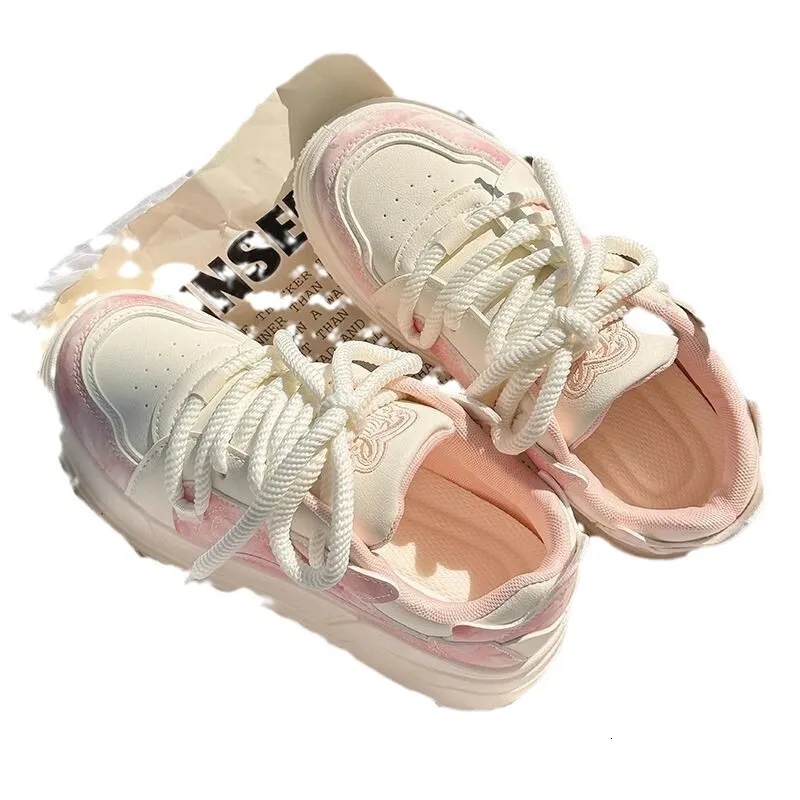 Sneakers platform da donna rosa e bianche sfumate con lacci spessi dal design classico_voghion.com