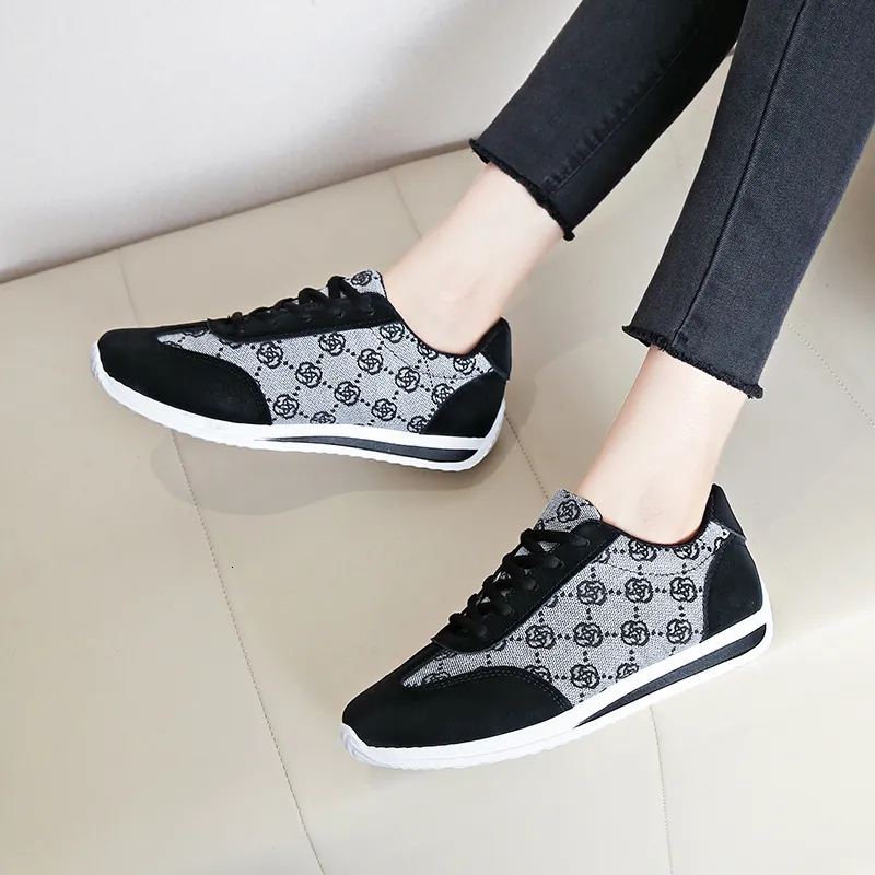 Dames casual sneakers in bruin met monogramprint, laag model, schokabsorberend, met vetersluiting._voghion.com