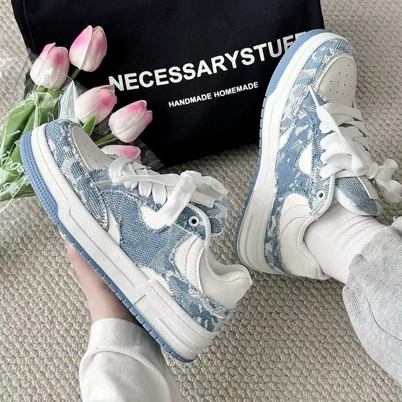 Scarpe da ginnastica basse casual da skate, da donna e da uomo, in tela jacquard bianca e nera con assorbimento degli urti._voghion.com