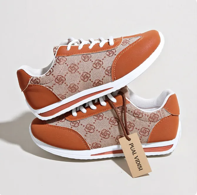 Dames casual sneakers in bruin met monogramprint, laag model, schokabsorberend, met vetersluiting._voghion.com