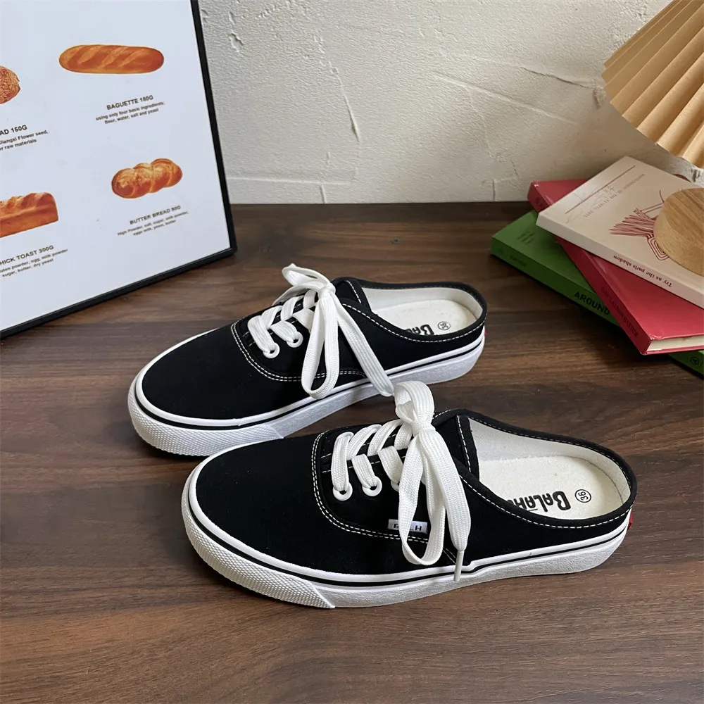 Röda slip on sneakers i canvas för dam med stötdämpande sula_voghion.com