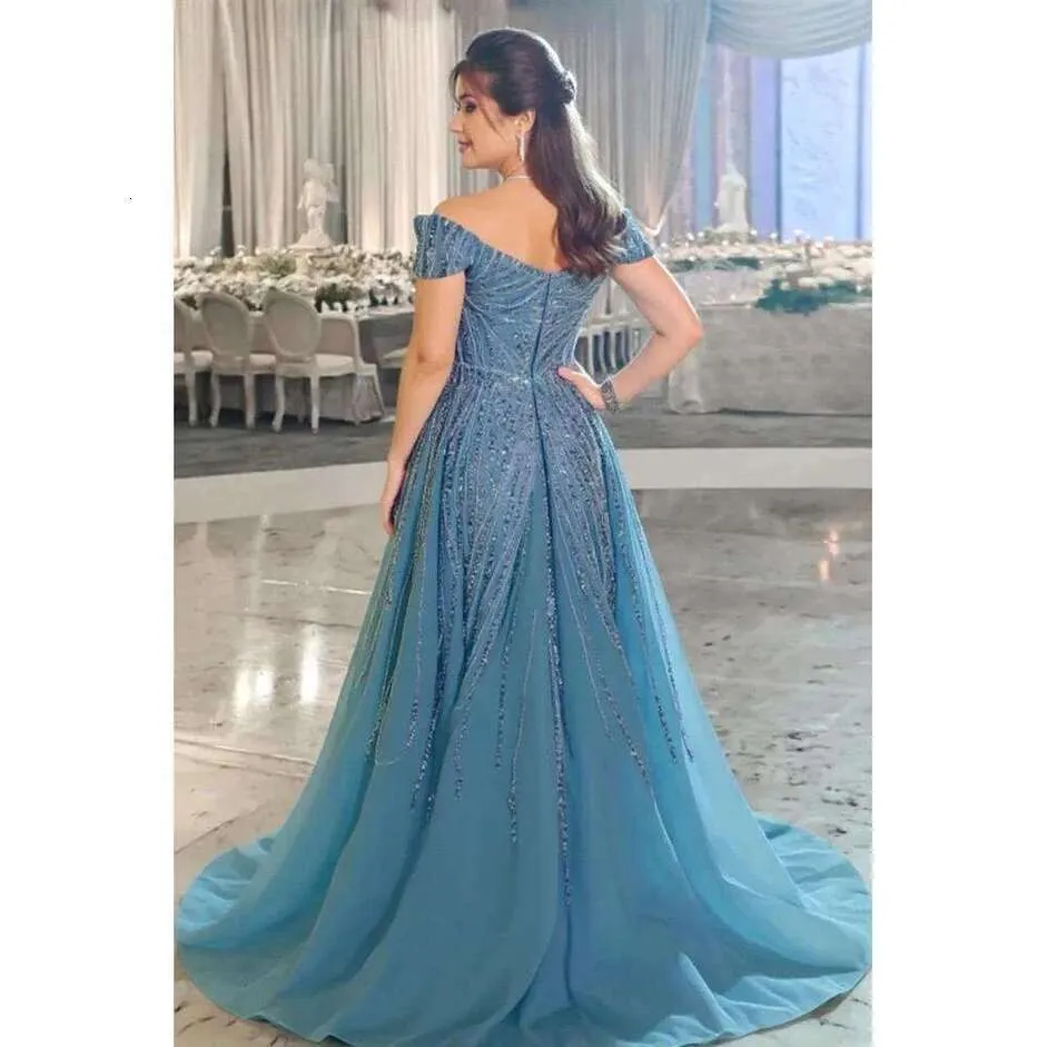 dusty blue mermaid dress Zapakasa Women Sparkly Sky Blue Ruched Long Corset Prom Dress Mermaid Satin Beaded Lace Up Back Strapless Formal Dress