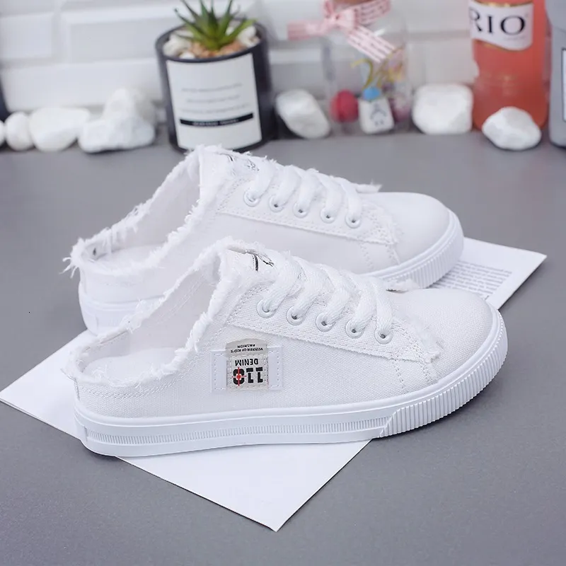 Dames instappers van canvas met rafelige franjes, casual sneakers zonder achterkant, perfect voor elke dag._voghion.com