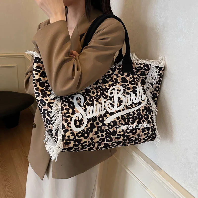 animal print travel tote bags Leopard Bag Leopard nylon travel tote with brown accents Leopard Print Travel Beach Tote