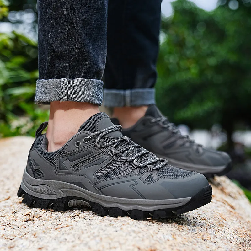 Scarpe da trekking da uomo per attività all'aperto, con tomaia in mesh traspirante e suola robusta antiscivolo, ideali per trekking e alpinismo._voghion.com