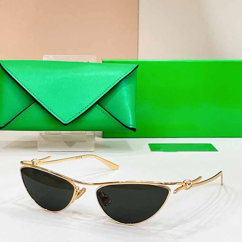 Luxury Metal Knot Cat Eye Green Lens Sunglasses For... From  display picture 3