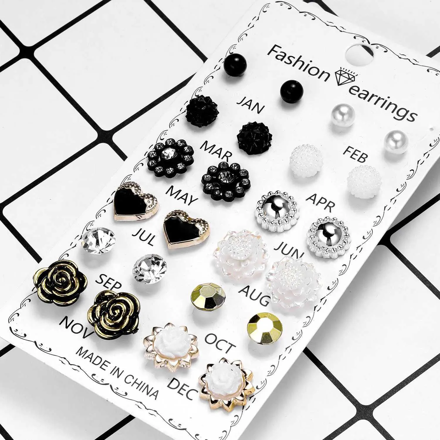 Set orecchini a lobo con cristalli fiori fiocco per donna_voghion.com