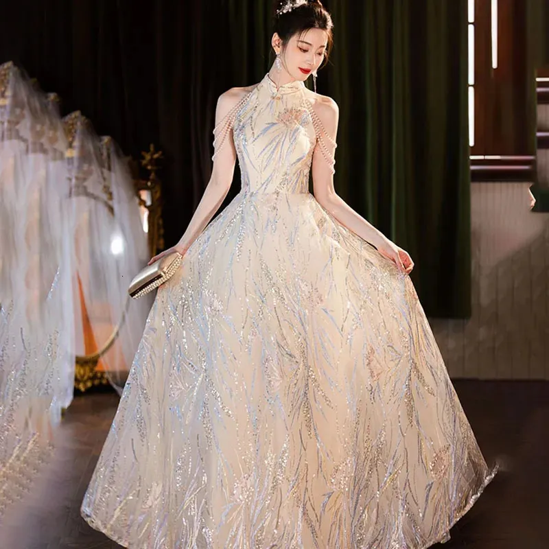 high end dresses for women Luxury Evening Dress XS / Silver while a daring high slit on one side adds a touch of sensuality and sophistication Elegant Long Sleeve Cocktail Dresses
