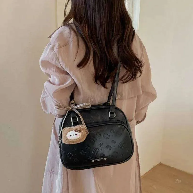 Womens Embossed Faux Leather Backpack With Bear... From  display picture 3