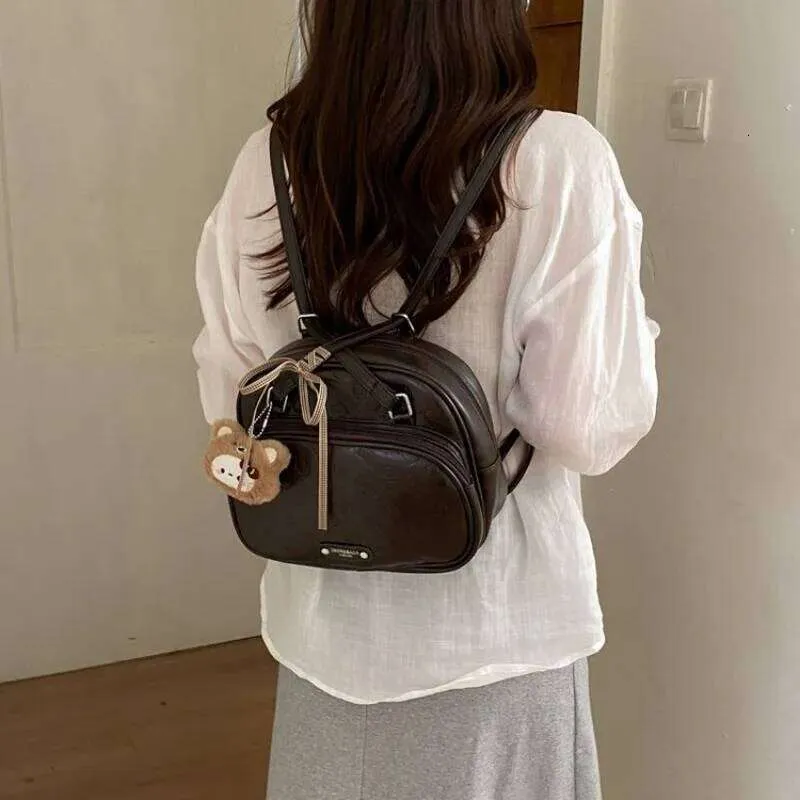Womens Embossed Faux Leather Backpack With Bear... From  display picture 2