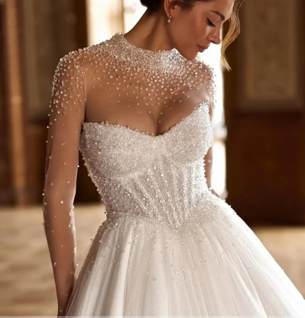 high quality dresses A-line Wedding High Neck Crystal Long Illusion Sleeve Buttons Back Tulle Princess Bridal Bride Party Gown Vestidos De Novia Printed in a high Gorgeous Plus-Size Formal Dresses |
