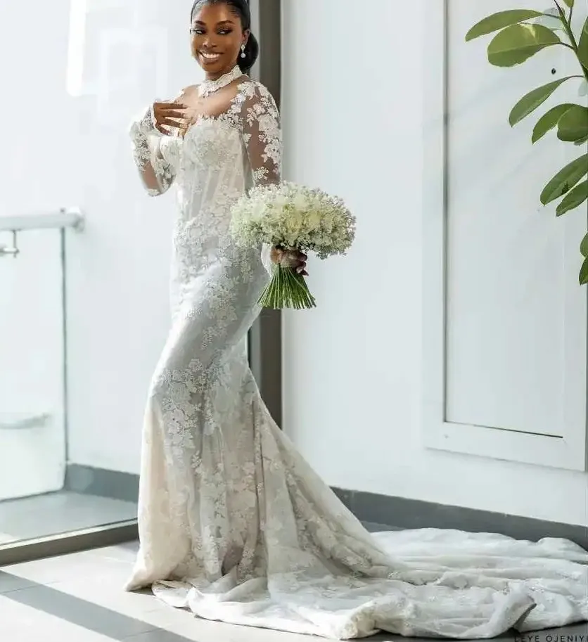 sheer wedding dresses with sleeves Gina This gown is fashioned from the finest fabrics Sheer-Sleeved Deep V-Neck Wedding Dress