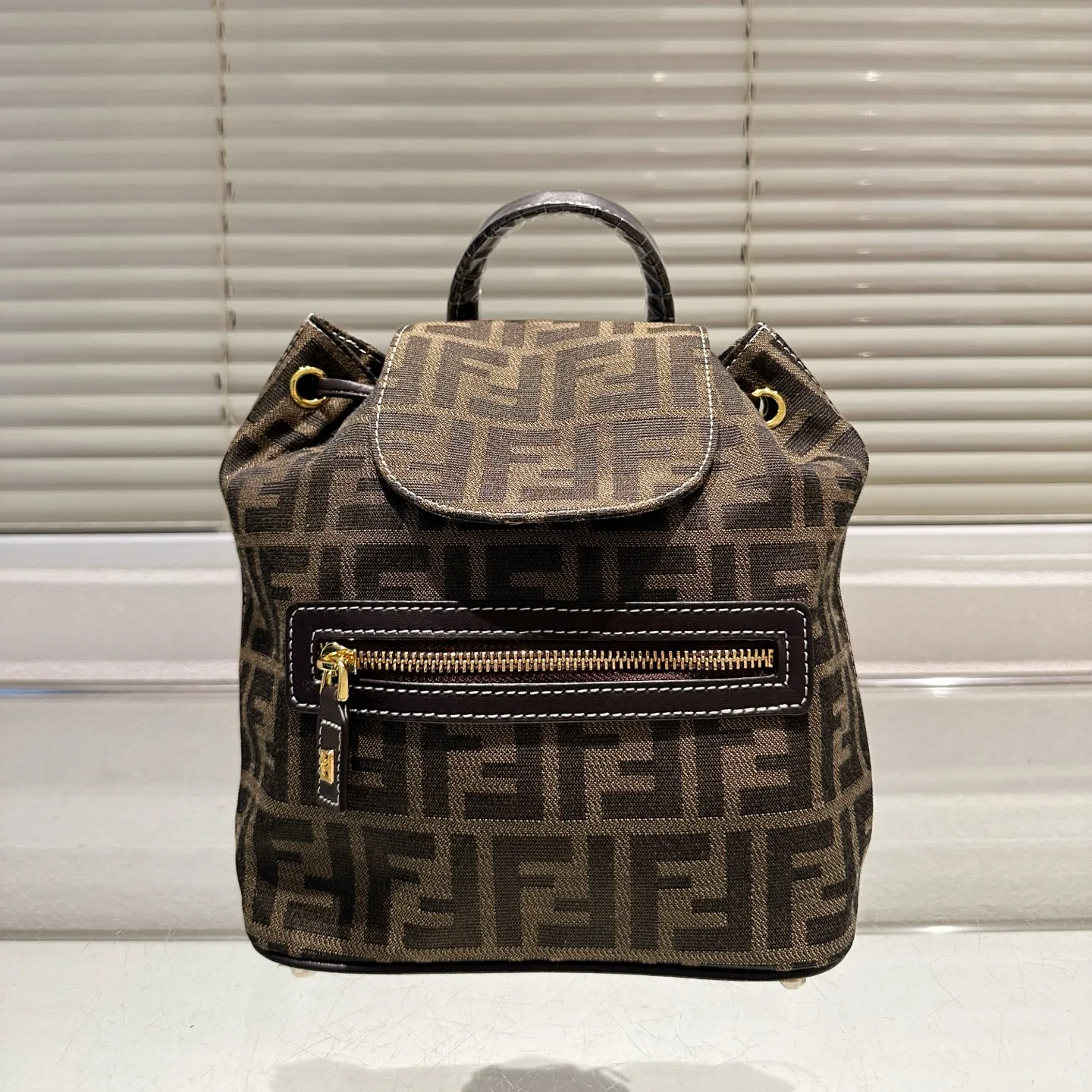 fendi mini ff backpack Curb chain accent at adjustable shoulder straps featuring pin Canvas Zucca FF Mini Backpack