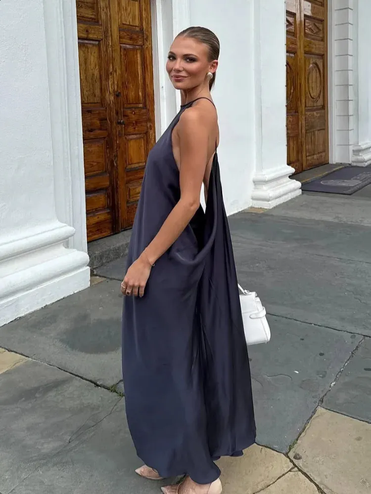 flowy halter maxi dress Green Ibiza The halter neck style adds a touch of sophistication Abby Olive Green Halter Maxi
