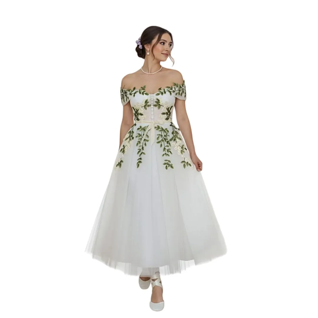 white wedding dress with green leaves Off The Shoulder Tea Length Dress, Leaf... From Chicweddings, Rs.10,108.53 main fabric: scuba