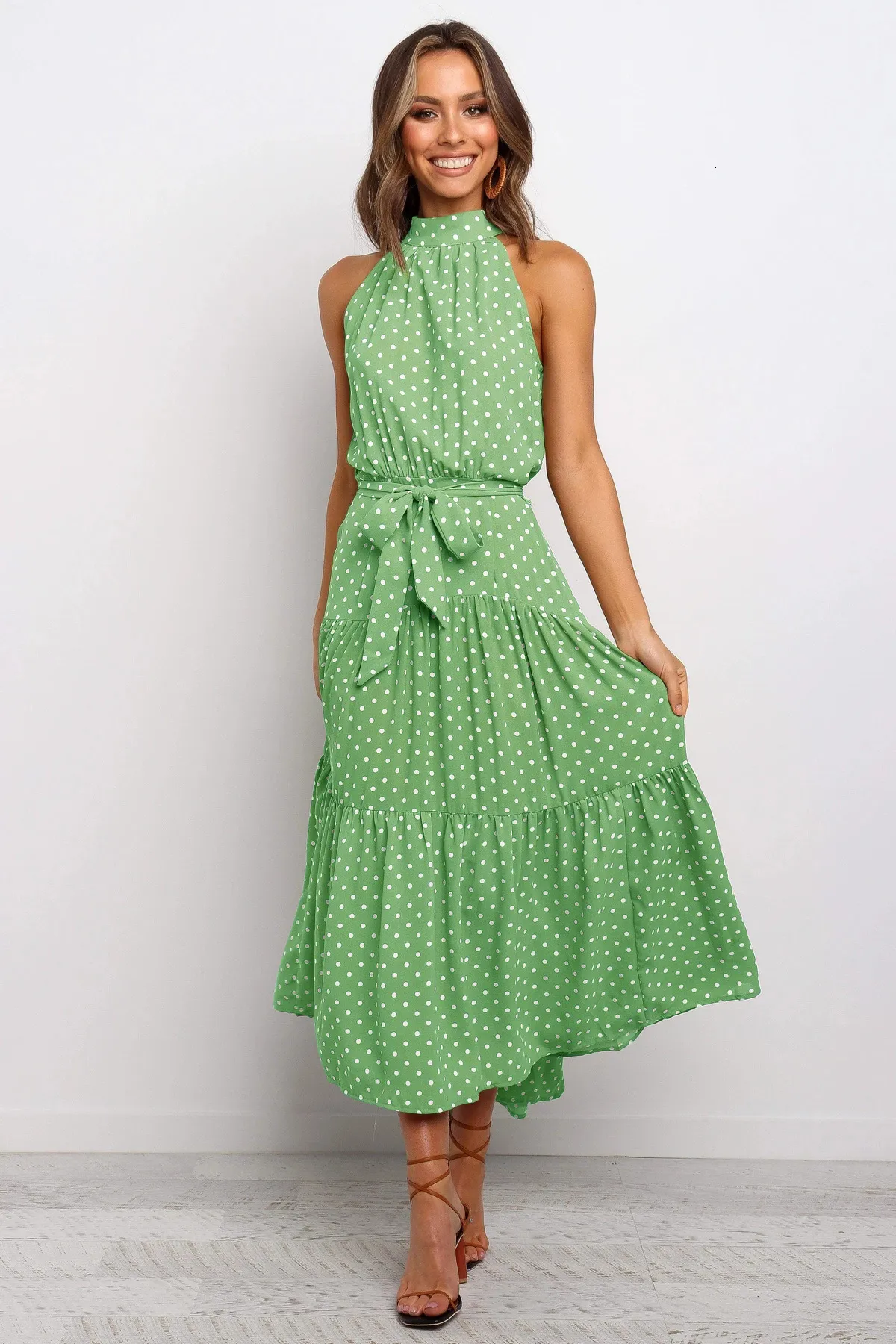 green polka dot halter neck dress Chic and Playful: Green Polka Dot Printed Halter Neck Skater Dress main image 1