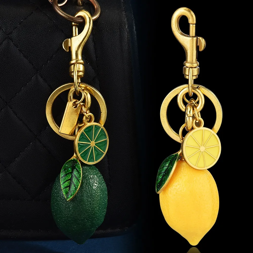 Hot Selling Charm New Creative Resin Simulation Fruit Lemon Car Bag Pendant Couple Keychain Gift Free Shipping_voghion.com