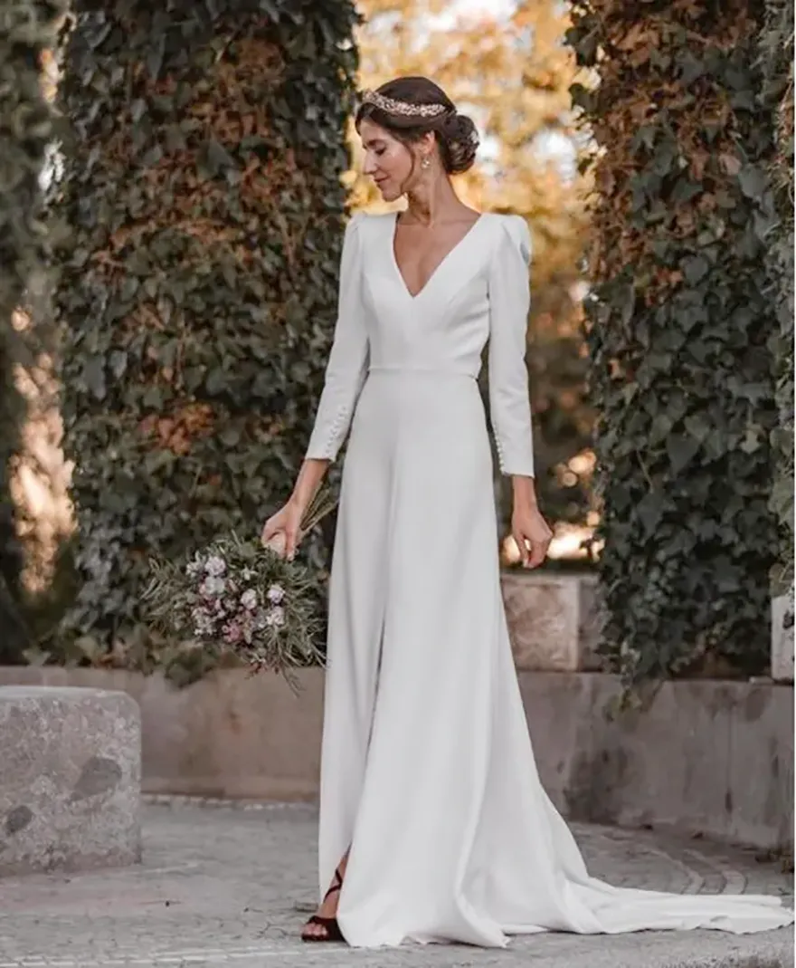 long sleeve crepe wedding dress Simple Minimalist Chiffon ET3001 Size 22W / Ivory Are you looking for a modest and minimalist wedding dress with a royal touch Long-Sleeve Crepe Backless Wedding