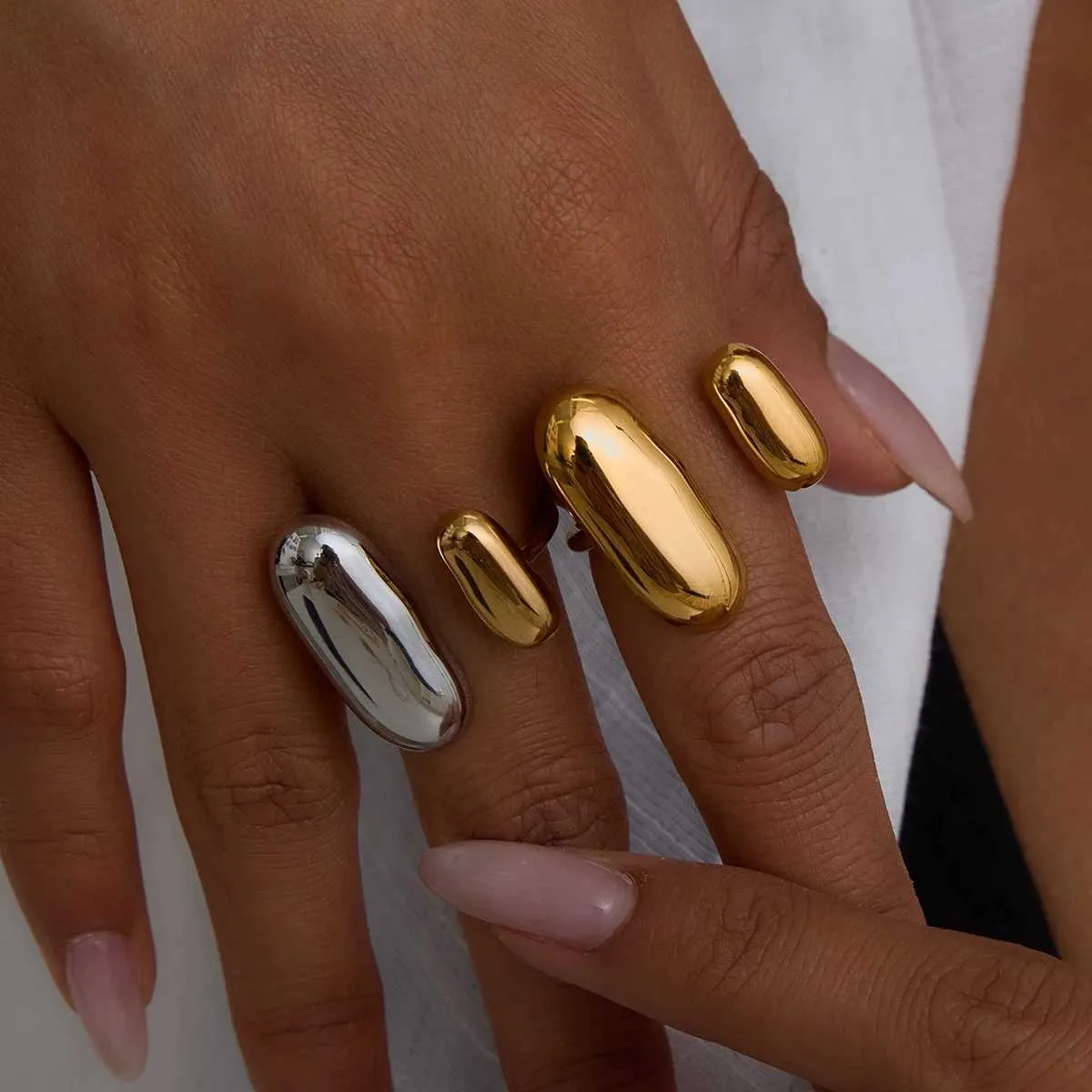 Bague ouverte géométrique ovale dorée en acier inoxydable femme_voghion.com