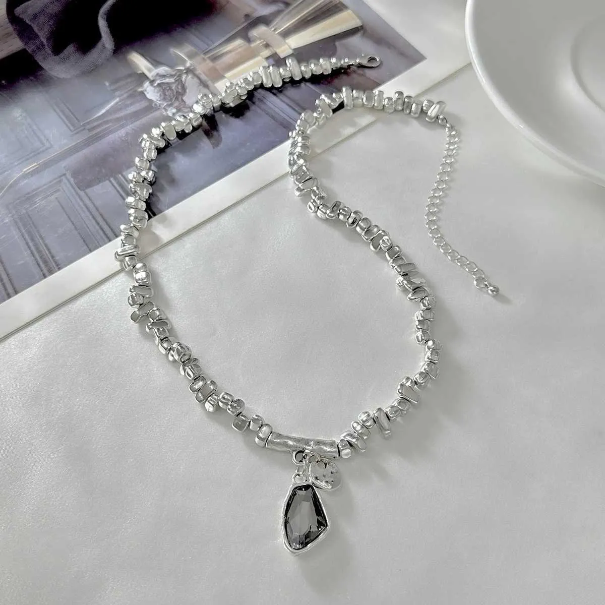 Set collana con pendente zircone nero e bracciale di perline_voghion.com