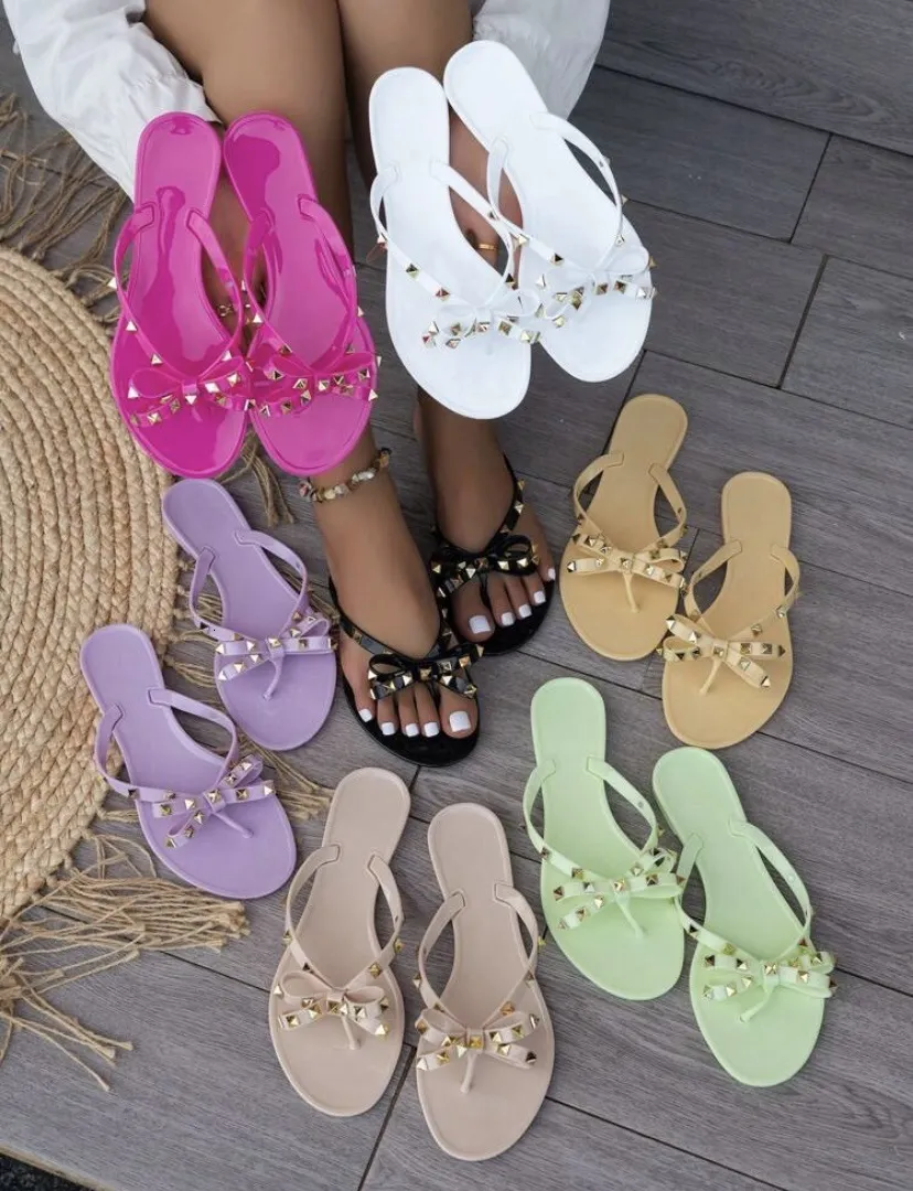 Women's Studded Jelly Flip Flops Bowknot Flat Beach Sandals_voghion.com