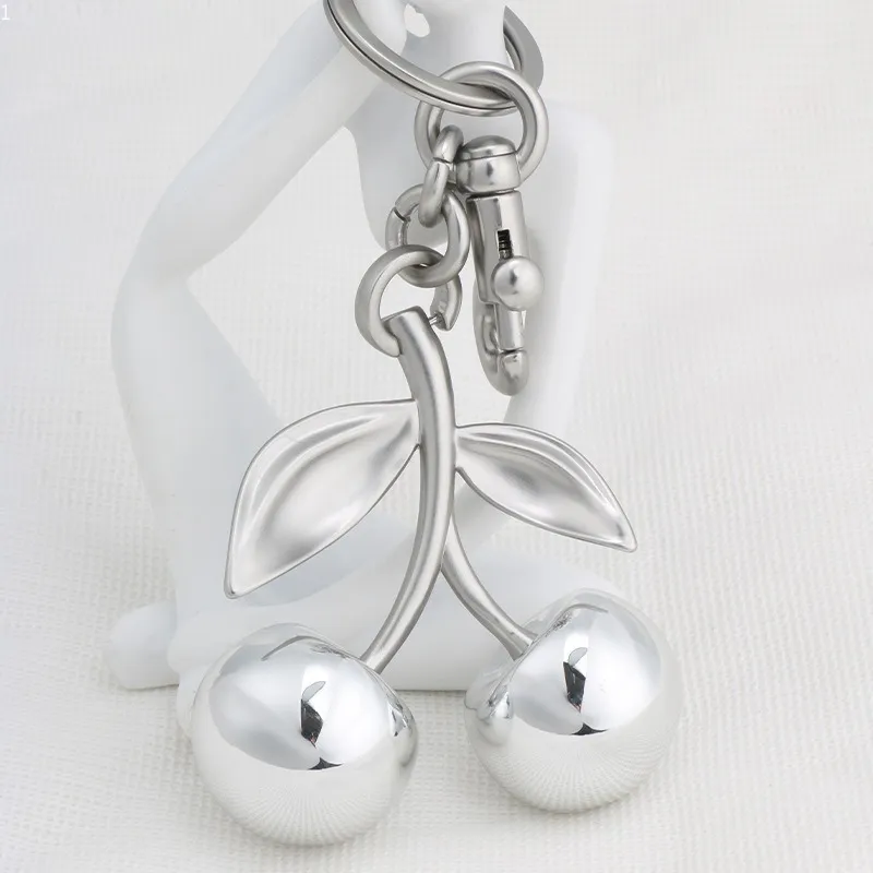 Silver Cherry Keychain NWT Coach Cherry Bag Charm/keychain (No Bag) Color: Silver/ Red Apple