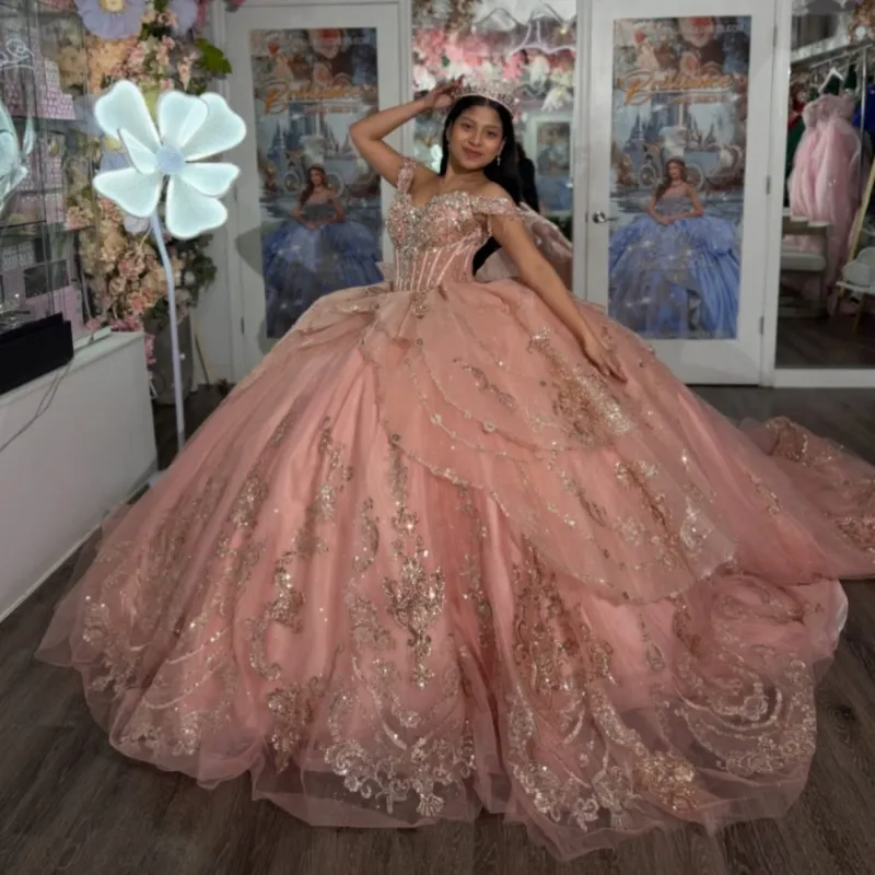 pink quince dress with bow in the back The bodice is adorned with intricate 3D floral lace appliques Glitter Off Shoulder with Back