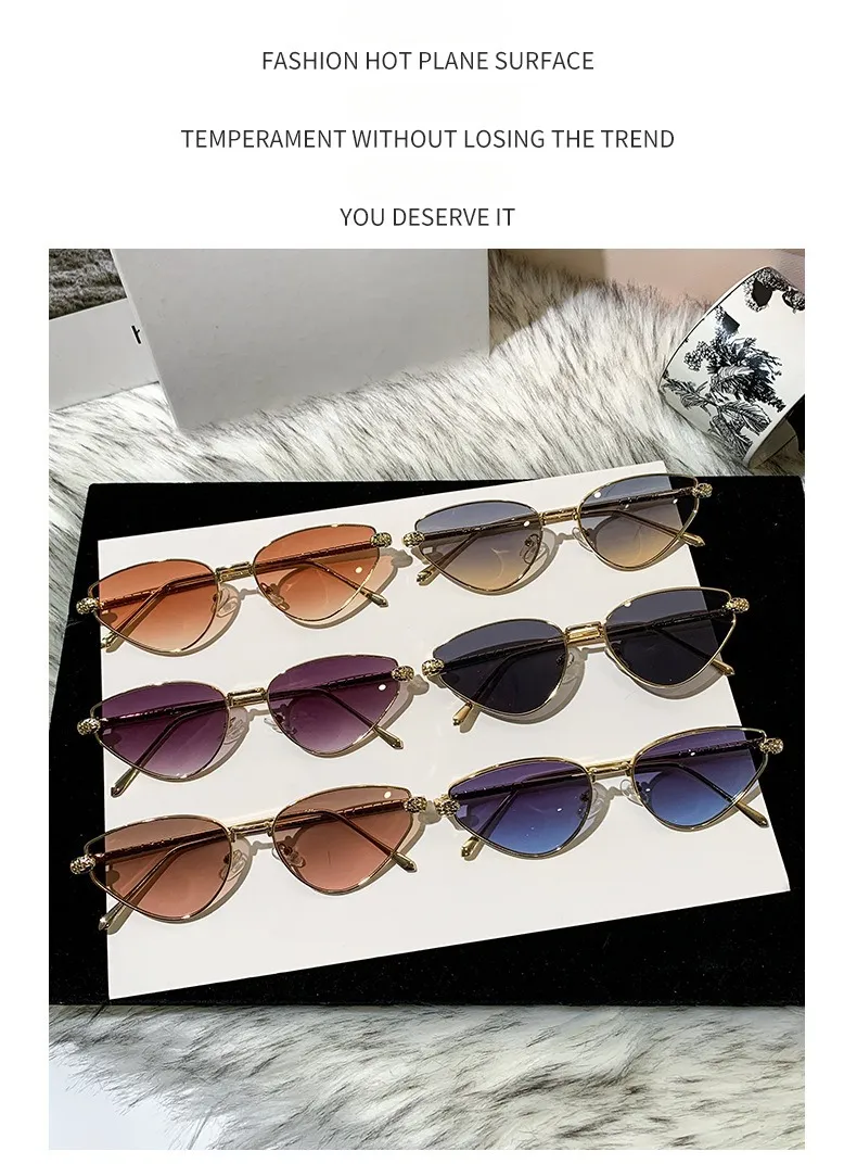 Thin Gold Metal Cat Eye Sunglasses With Carved... From  display picture 2
